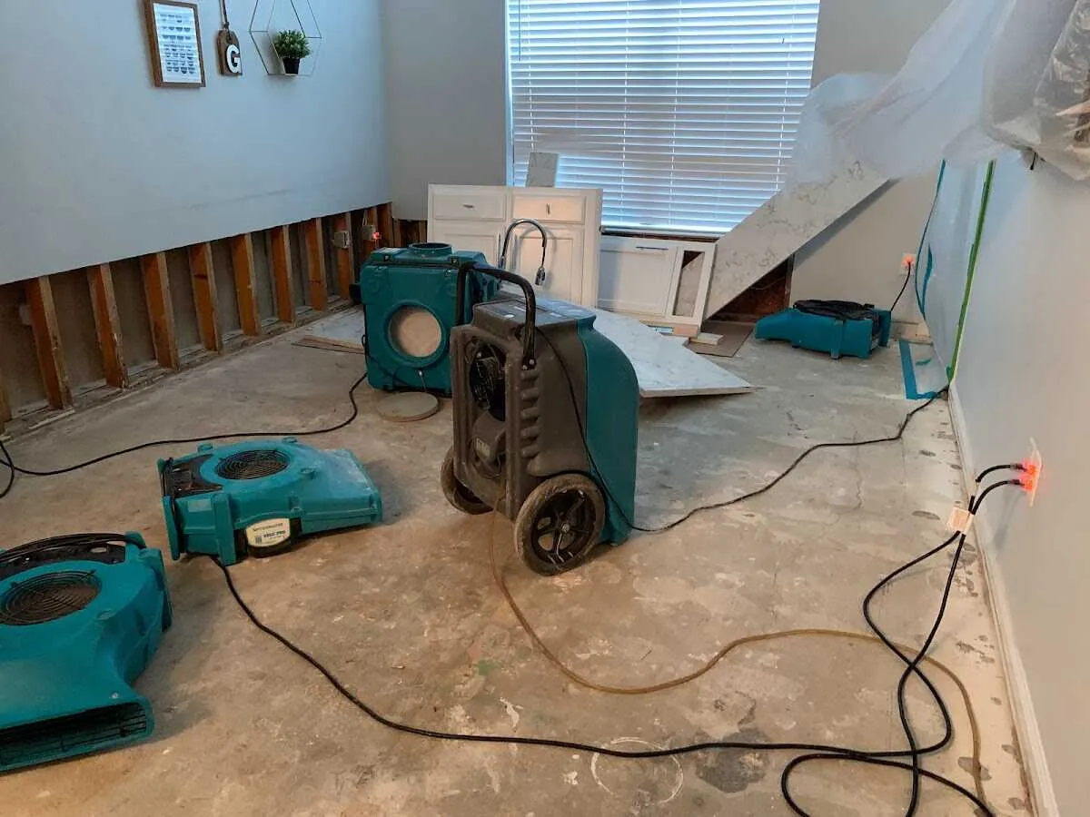 Dehumidifier in flood-cut room for Water Extraction & Removal in Alma
